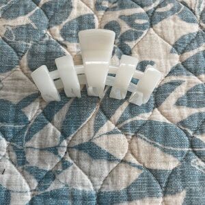 Creamy white Teleties claw hair clip, medium size.